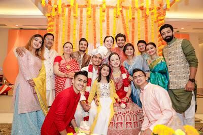 The couple with friends and family after their traditional Indian wedding ceremony at the temple in Jebel Ali. Photo: Suraj Negi