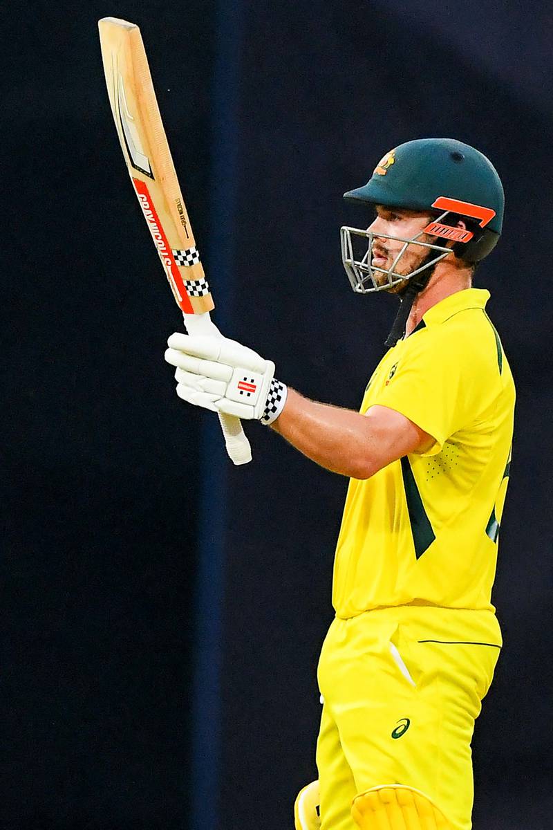 Australia's Travis Head celebrates scoring a half-century on his way to 70 not out. AFP