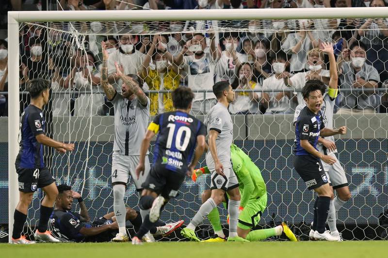 Keisuke Kurokawa, right, celebrates after scoring for Gamba Osaka in the first half. AP