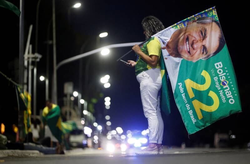 A supporter of President Jair Bolsonaro in Brazil's capital Brasilia, after polls closed in the country's presidential election on Sunday. Reuters