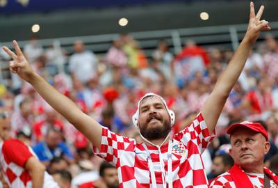 A supporter of Croatia before the start of the final. EPA