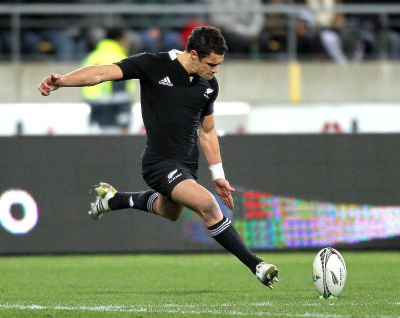 Dan Carter of New Zealand shown kicking a conversion during the 2011 Tri-Nations tournament against South Africa. Carter announced on Thursday he will leave New Zealand after the 2015 Rugby World Cup. Marty Melville / AFP 
