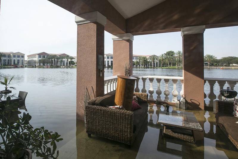 The outdoors area of a villa in Block C of the Green Community after last week’s floods. Mona Al Marzooqi / The National