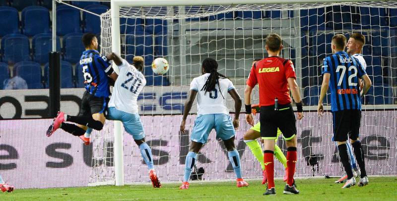 Atalanta's Jose Luis Palomino, left, scores against Lazio. AP Photo