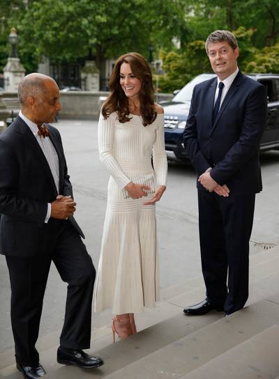 LONDON, ENGLAND - JULY 07: Catherine, Duchess of Cambridge is greeted by Lord-Lieutenant Ken Olisa (L) and Sir Michael Dixon, Director of the Natural History Museum as she arrives to present the Art Fund Museum of the Year 2016 prize at a dinner hosted at the Natural History Museum on July 6, 2016 in London, United Kingdom. The Art Fund Museum of the Year prize is awarded annually to one outstanding museum which has shown exceptional imagination, innovation and achievement in the preceding year. (Photo by Matt Dunham - Pool/Getty Images)
