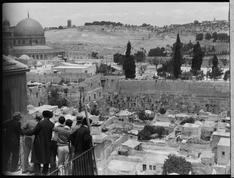 A view of the Moroccan Quarter, with the Dome of the Rock and Western Wall behind, in the Old City of Jerusalem in 1920. Library of Congress / Matson (G Eric and Edith) Photograph Collection 