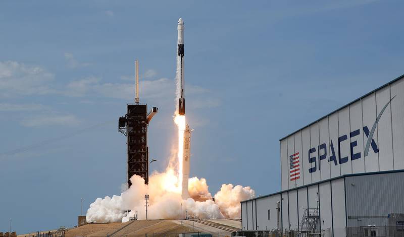 FILE PHOTO: A SpaceX Falcon 9 rocket and Crew Dragon spacecraft carrying NASA astronauts Douglas Hurley and Robert Behnken lifts off during NASA's SpaceX Demo-2 mission to the International Space Station from NASA's Kennedy Space Center in Cape Canaveral, Florida, U.S., May 30, 2020. REUTERS/Joe Skipper/File Photo