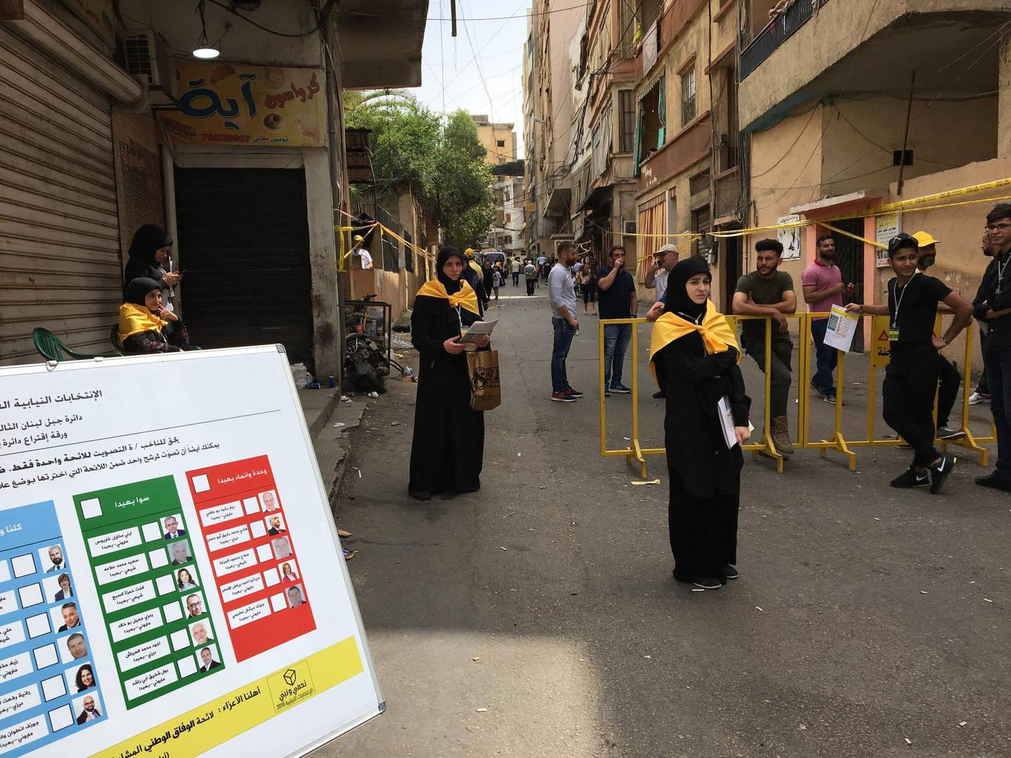 The scene in Bourj al Barajneh, southern Beirut, as Hezbollah volunteers wait to assist voters.