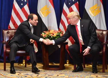 Egyptian President Abdel Fatah El Sisi and US President Donald Trump shake hands at a meeting in New York on September 24, 2018. AFP