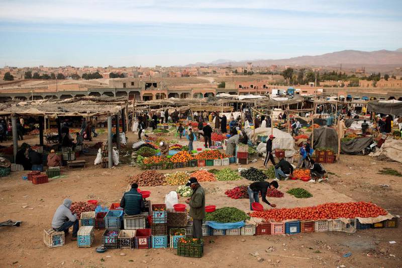 Amazigh villagers shop for fruits and vegetables on February 3, 2016, at a weekly local market in Kalaat M’Gouna, in Ouarzazate, Morocco.