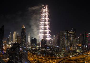 Burj Khalifa stages a fireworks display for New Year. Ruel Pableo for The National