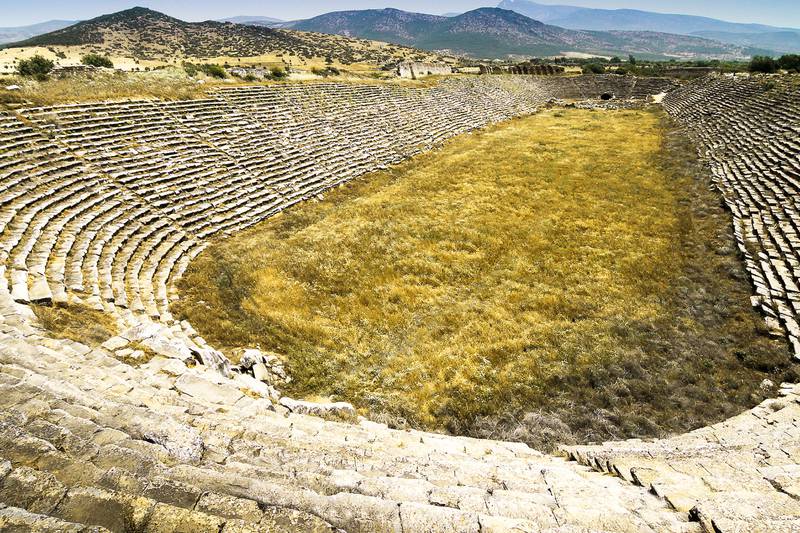 Panoramic view down the length of the ancient stadium at Aphrodisias, Turkey. This is probably the best-preserved example of this type of stadium in the Mediterranean. It is 262 m long and 59 m wide with 22 rows of seats. It had a seating capacity of about 30 000.