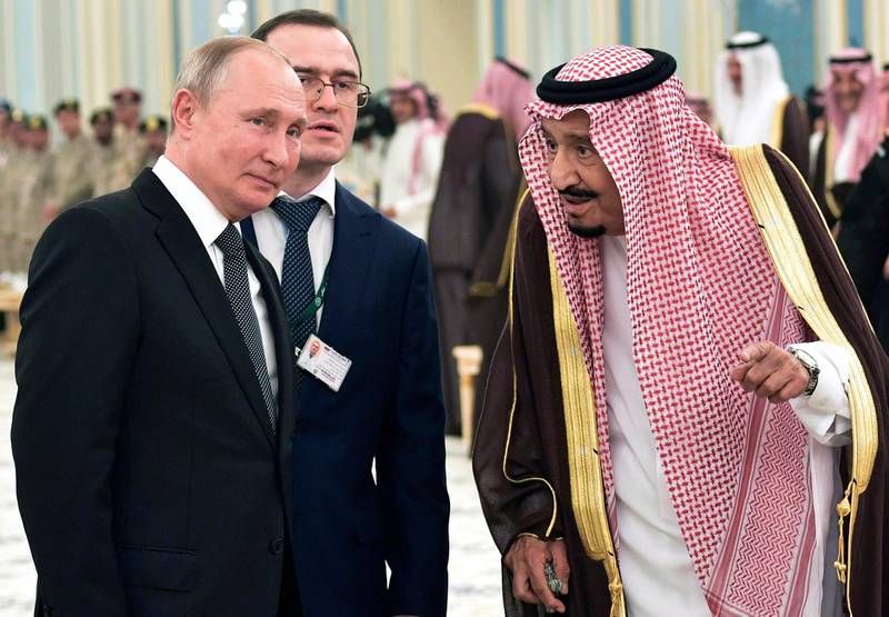 Mr Putin and King Salman talk during their meeting. Kremlin Pool Photo via AP