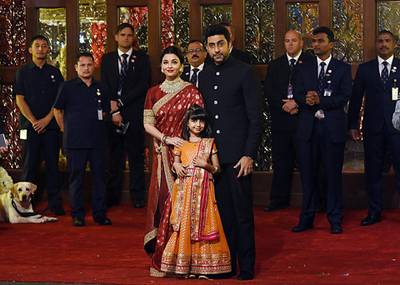 Indian Bollywood actors Aishwarya Rai Bachchan and Abhishek Bachchan with daughter Aradhya pose for a picture. AFP