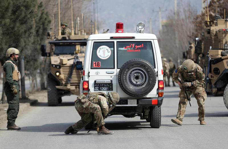 British soldiers with NATO-led Resolute Support Mission forces check an ambulance near the site of an attack in Kabul. AP Photo