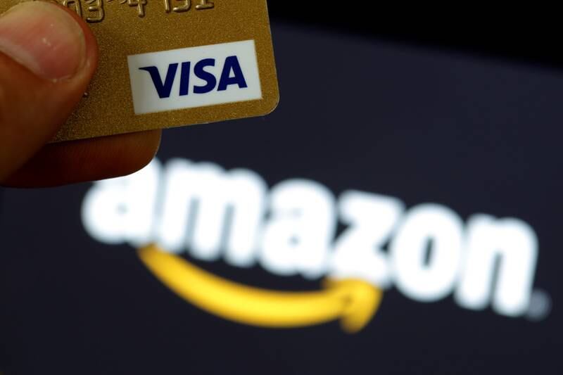 Amazon says it will continue to accept UK-issued Visa credit cards this year amid a dispute over high charges. Reuters.