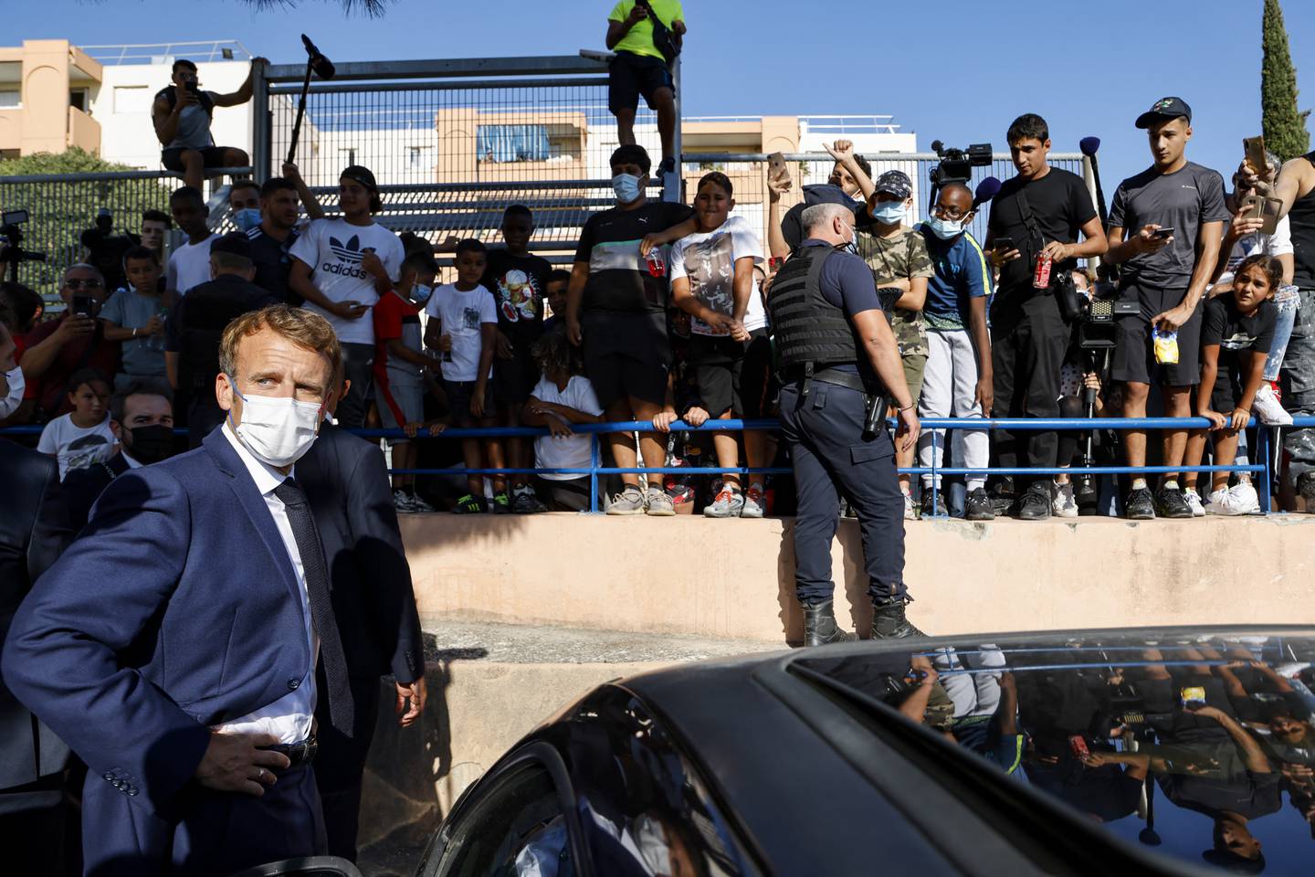 French President Emmanuel Macron arrives to meet residents of Marseille's Bassens district on the first day of a three-day visit on September 1, 2021. Photo: AFP