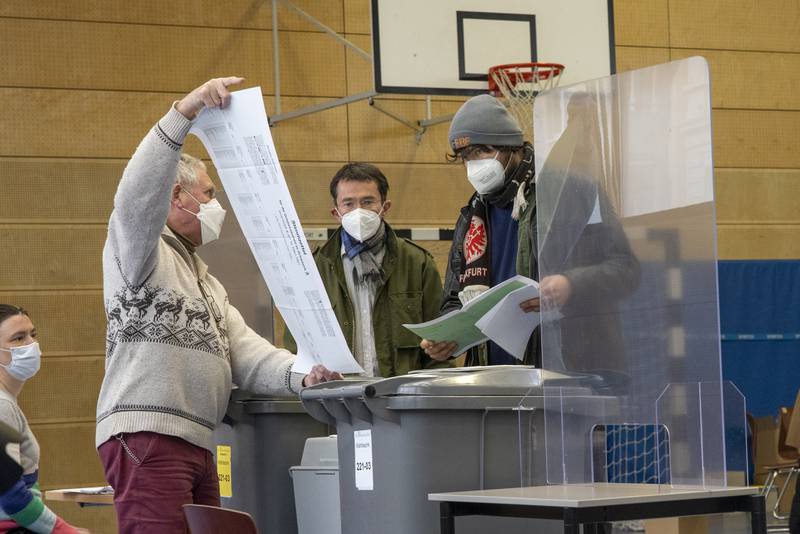 An election worker holds up a ballot paper at local elections in March, with all of Germany heading to the polls in September. AP