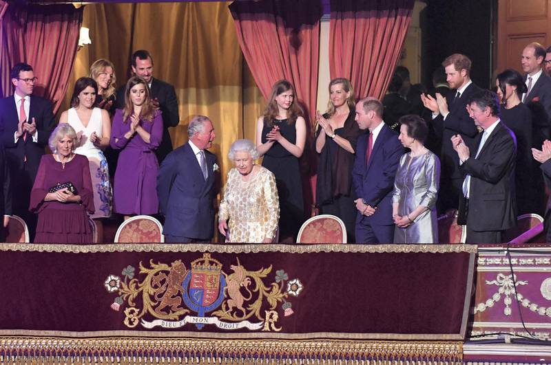 LONDON, ENGLAND - APRIL 21:  Camilla, Duchess of Cornwall, Princess Eguenie, Princess Beatrice, Prince Charles, Prince of Wales,Lady Louise Windsor, Sophie, Countess of Wessex, Prince William, Duke of Cambridge, Princess Anne, Princess Royal, Vice Admiral Sir Timothy Laurence, Prince Harry, Meghan Markle and Prince Edward welcome Queen Elizabeth II at a star-studded concert to celebrate her 92nd birthday at the Royal Albert Hall on April 21, 2018 in London, England.  The Queen and members of the royal family are guests of honour at the celebration, which is being billed as The Queen's Birthday Party. (Photo by John Stillwell - WPA Pool/Getty Images)