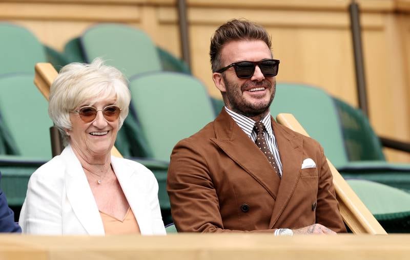 David Beckham and his mother Sandra West watch from the Royal Box prior to the match between Rafael Nadal and Taylor Fritz. Getty Images