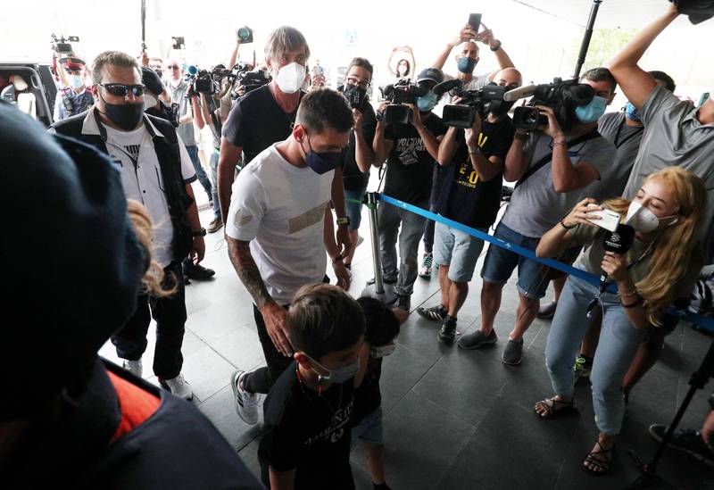 Lionel Messi arrives at Josep Tarradellas Barcelona-El Prat Airport with his wife Antonella and children to board a charter flight to Paris.