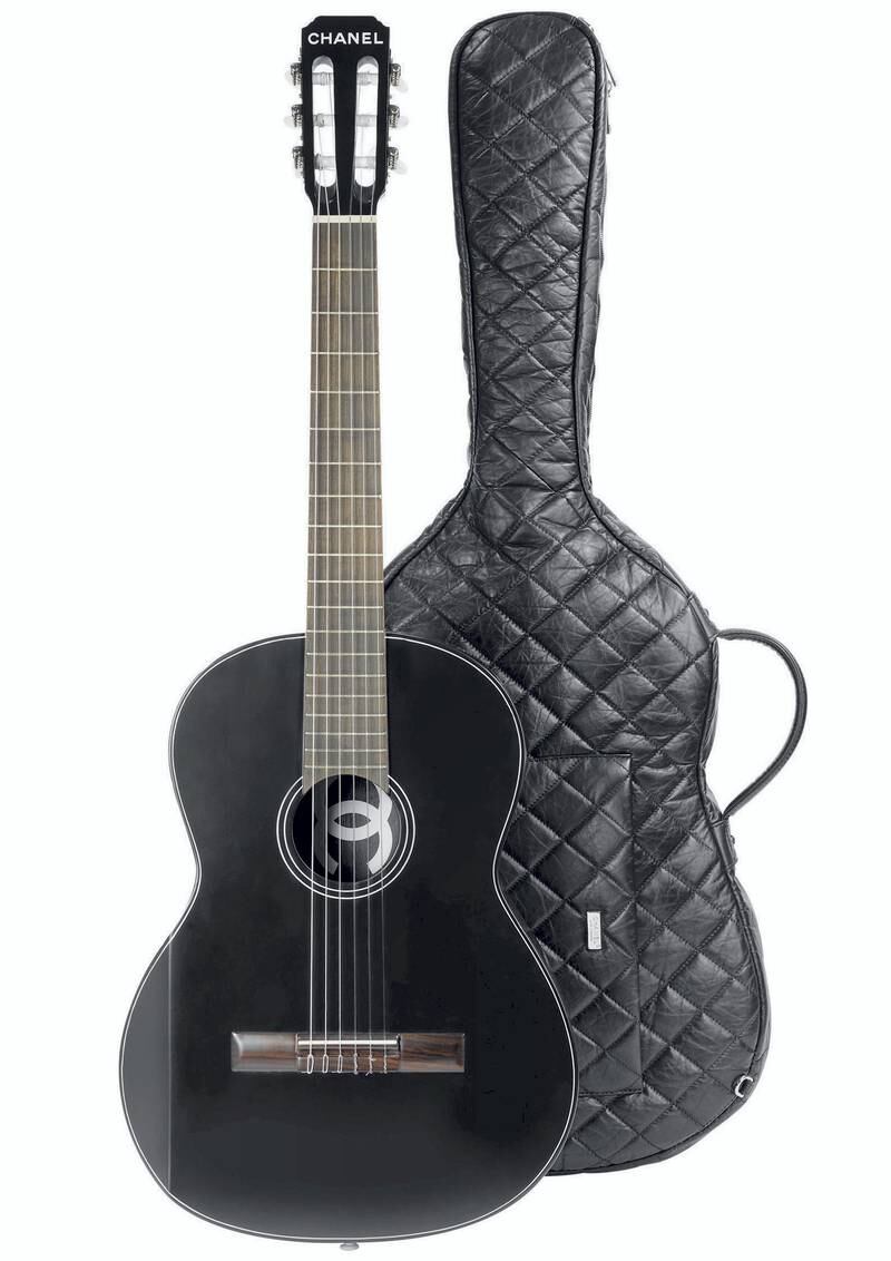Millionaire musicians: who needs Gibson when you have Chanel? The guitar features a lacquered spruce wood body, quilted leather case and logos galore.