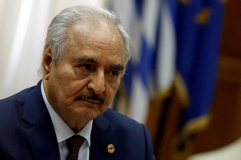 FILE PHOTO: Libyan commander Khalifa Haftar meets Greek Prime Minister Kyriakos Mitsotakis (not pictured) at the Parliament in Athens, Greece, January 17, 2020. REUTERS/STAFF/File Photo