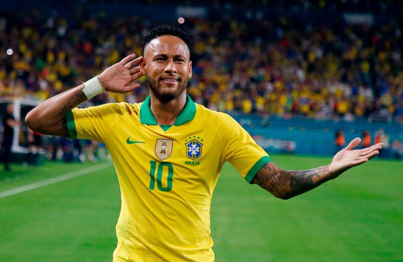 Neymar celebrates after scoring against Colombia. AFP