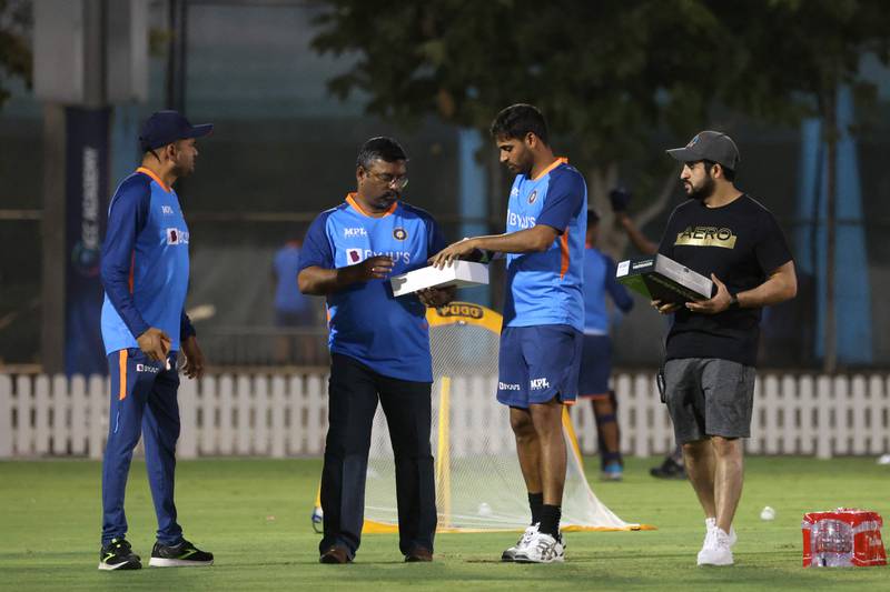 The Indian team practise at the academy ground. AFP