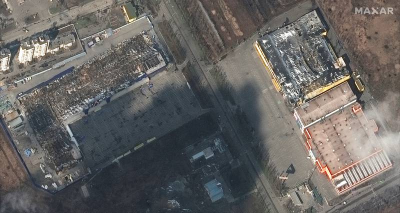 A satellite image shows destroyed grocery stores and shopping malls in Mariupol on March 9 amid Russia's ongoing invasion of Ukraine. Maxar Technologies via Reuters