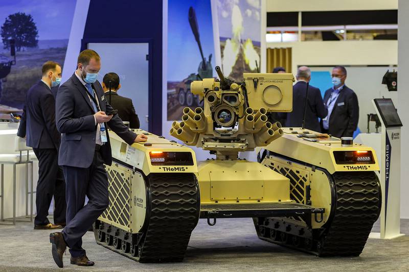 Milrem Robotics' Estonia-built tracked hybrid modular infantry system unmanned ground vehicle, known as THeMIS, at the Doha International Maritime Defence Exhibition in the Qatari capital.