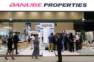Visitors at the Danube Properties stand on the first day of Cityscape Global in Dubai.