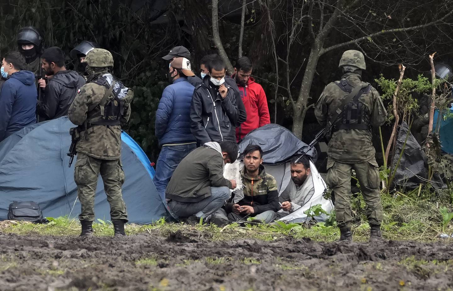 Poland has been reinforcing its border with Belarus – also part of the EU's eastern border – after thousands of migrants from Iraq, Afghanistan and elsewhere tried to enter the country. AP