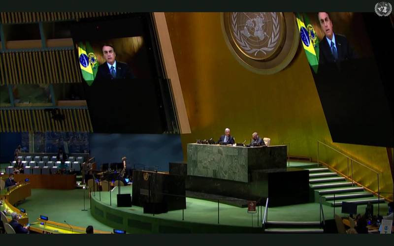 Brazilian President Jair Bolsonaro, top, speaks in a pre-recorded message being played during the 75th session of the United Nations General Assembly. UNTV via AP