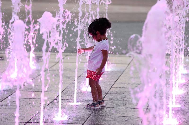 A toddler enjoys herself at the annual event, which is marking its silver jubilee edition.