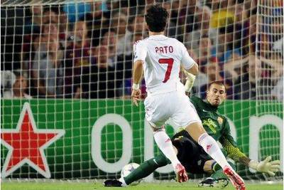 AC Milan's Alex Pato, left, exposed Barcelona's Victor Valdes in the first minute.
