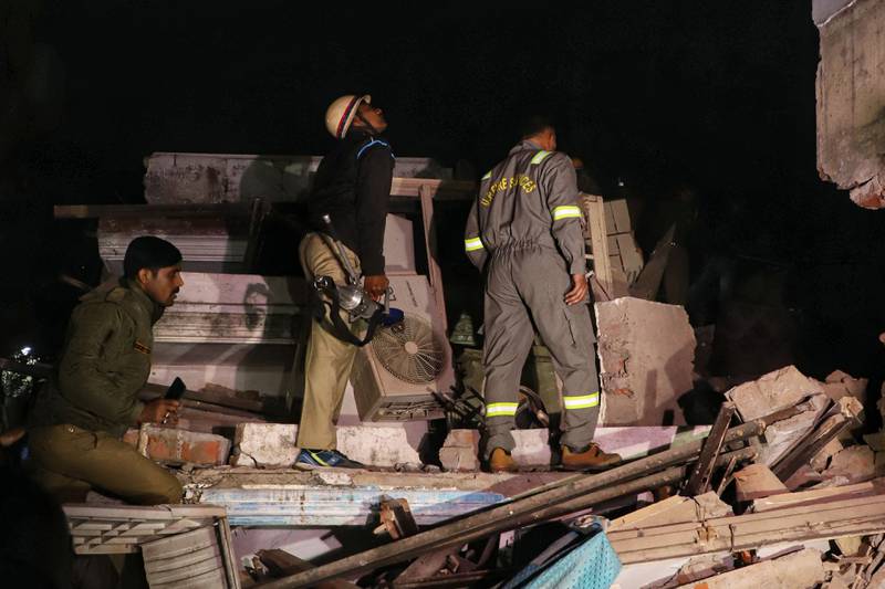 Rescuers search for survivors. AFP