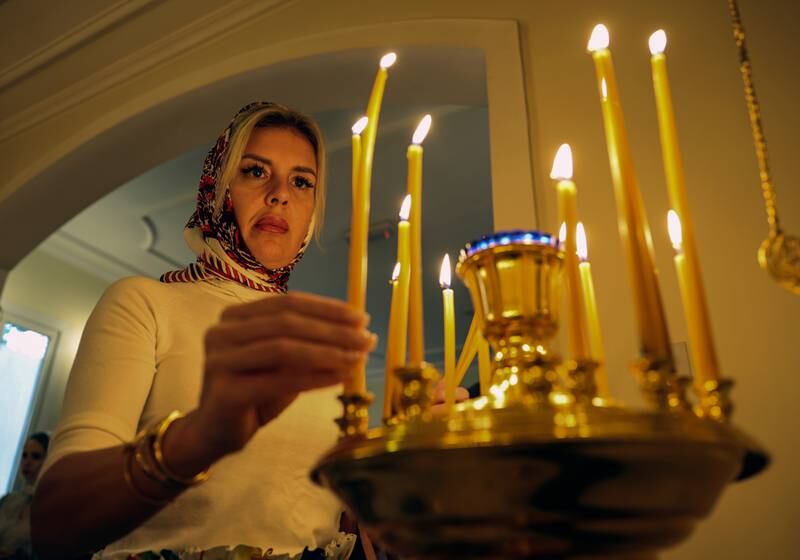 An Orthodox Christian lights candles during a Christmas service at the Russian Orthodox Church of Saint Philip the Apostle in Sharjah. The Russian Orthodox Church celebrates Christmas on 7 January according to the Julian calendar. All photos by EPA