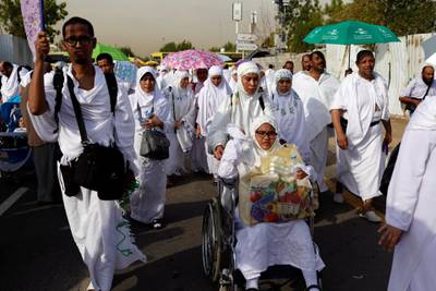 Muslims arrive to reach the summit of Mount Arafat. AP Photo