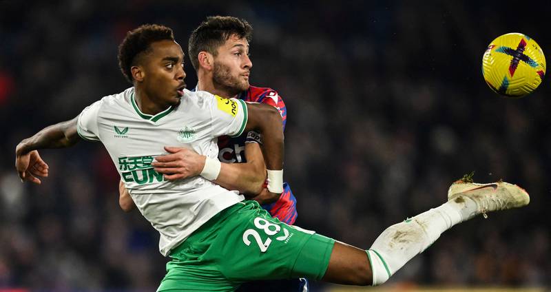 Newcastle midfielder Joe Willock and Palace defender Joel Ward battle for the ball. AFP