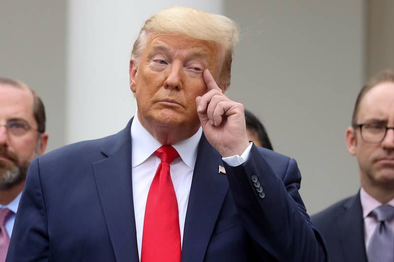 US President Donald Trump pauses during a news conference where he declared the coronavirus pandemic a national emergency in the Rose Garden of the White House in Washington, US, March 13, 2020. Reuters