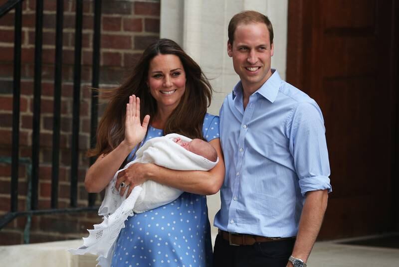 Catherine and Prince William with their son, Prince George, at St Mary's Hospital in London, July 2013. 