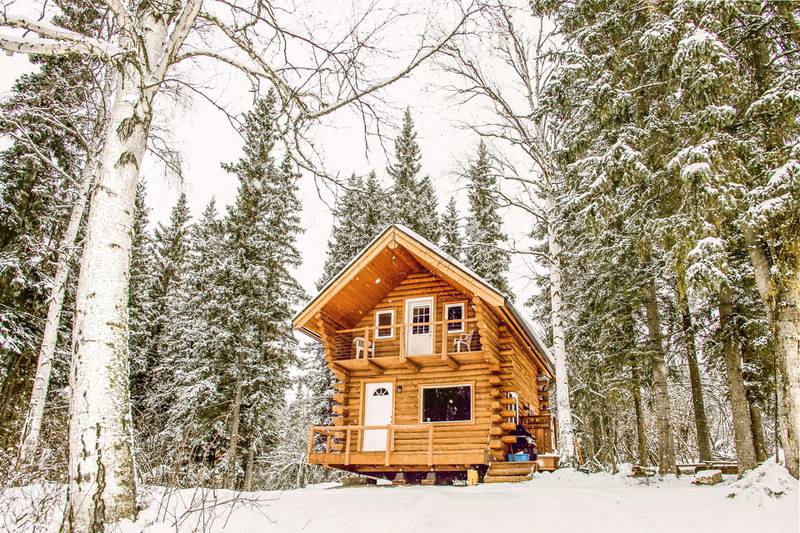 This snow-surrounded cosy cabin is Alaska's most wishlisted Airbnb stay. Coutesy Airbnb 