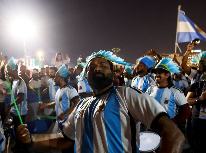 Argentina fans dance with drums at a popular tourist area in Souq Waqif. Reuters