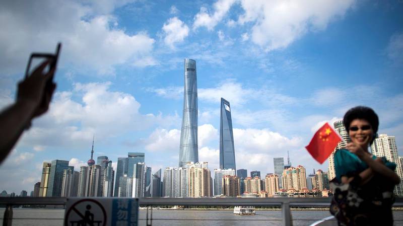 S&P cut China's sovereign rating by one step last week to A+ from AA-. Johannes Eisele / AFP