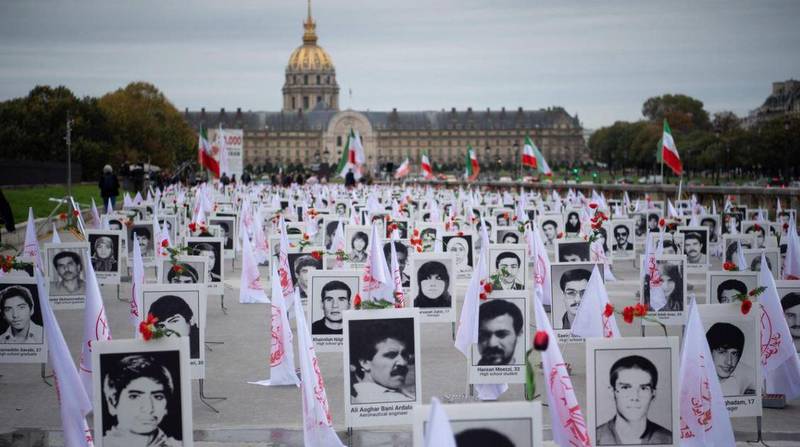 The 1988 executions of thousands of Iranian political prisoners were commemorated by representatives of the People's Mujahedin of Iran in France in 2019. AFP  