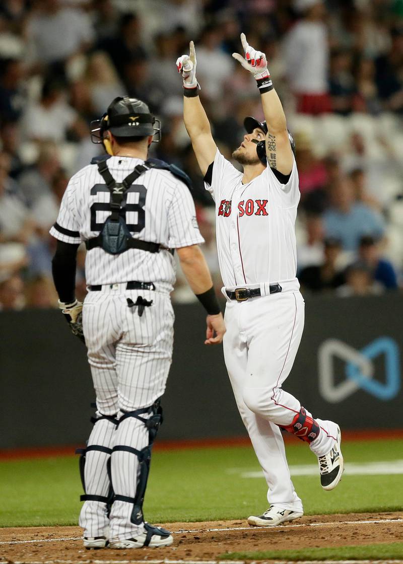 Boston Red Sox's Michael Chavis celebrates his three-run home run against the New York Yankees during the seventh inning of a baseball game in London. Major League Baseball made its European debut game Saturday at London Stadium. AP