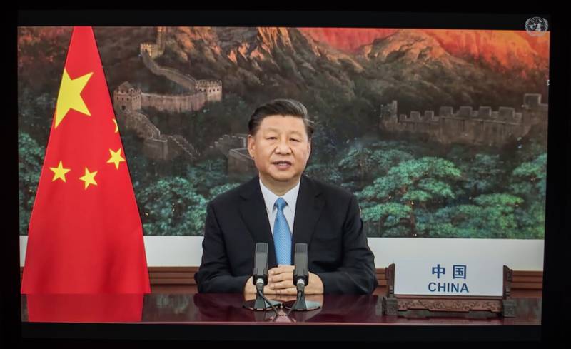 Chinese President Xi Jinping urged the world to “reject attempts to build blocks to keep others out” as an image of his country’s storied Great Wall hung behind. Bloomberg