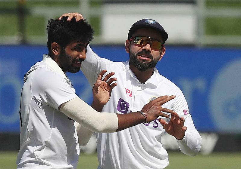 India bowler Jasprit Bumrah celebrates with Virat Kohli after taking the wicket of South Africa's Keegan Petersen in the third Test at Newlands Cricket Ground in Cape Town, on Wednesday, January 12. Reuters