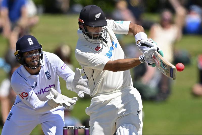 New Zealand's Daryl Mitchell, right, bats in front of England's Ben Foakes. AP